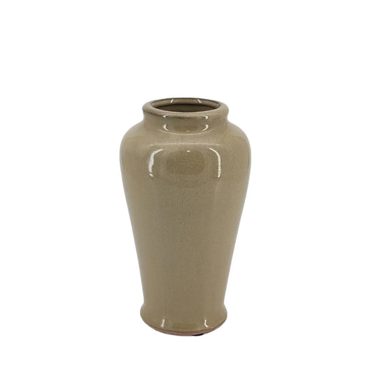 Beige ceramic vase on a white background