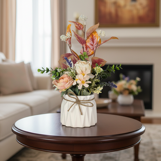 Floral arrangement in a vase on a wooden table in a living room.