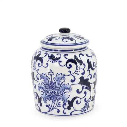 White ceramic jar with blue floral and swirl patterns on a white background
