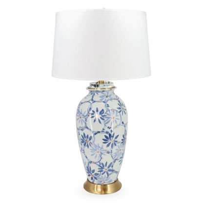 Decorative table lamp with floral pattern on a white background