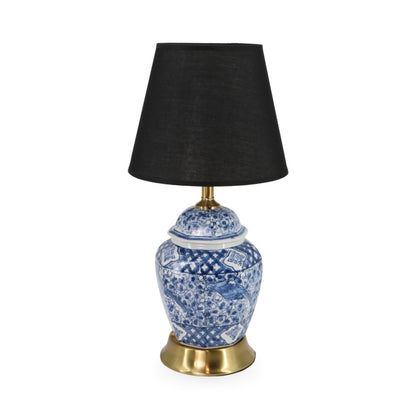 Table lamp with blue floral design on a white background