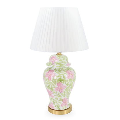 Decorative lamp with floral design on a white background